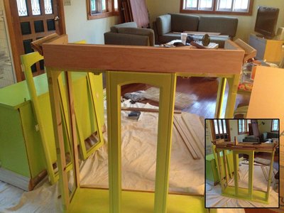 Deconstructed cabinet, new pieces added, painted, and reassembled.
