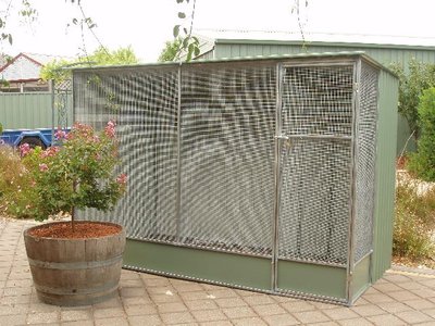 This is one of the newest aviaries just after we had finished putting it together, since then its had the wire painted black.
