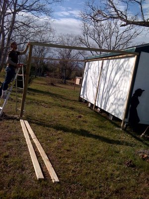 peter hard at work! he fell of the ladder about 2 min later LOL