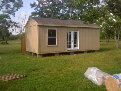 outer shell is done! and doors and windows in!