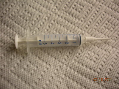 5 ml syringe and small feeding tip.